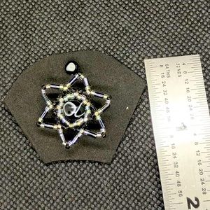 Flexible beaded belly ring/shield